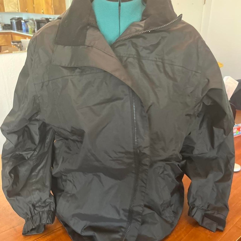 Black and grey waterproof jacket with removable hood